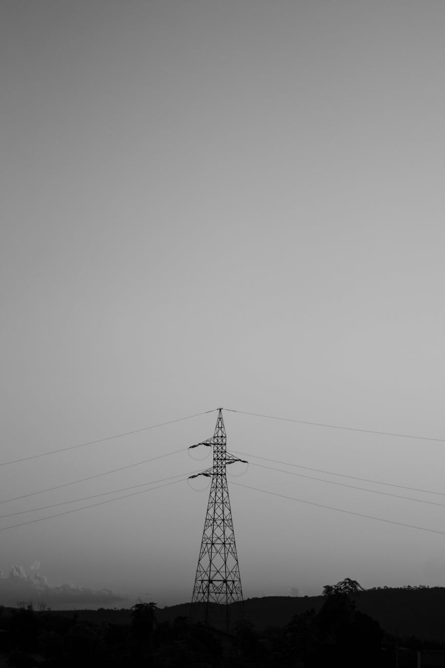 transmission tower in black and white