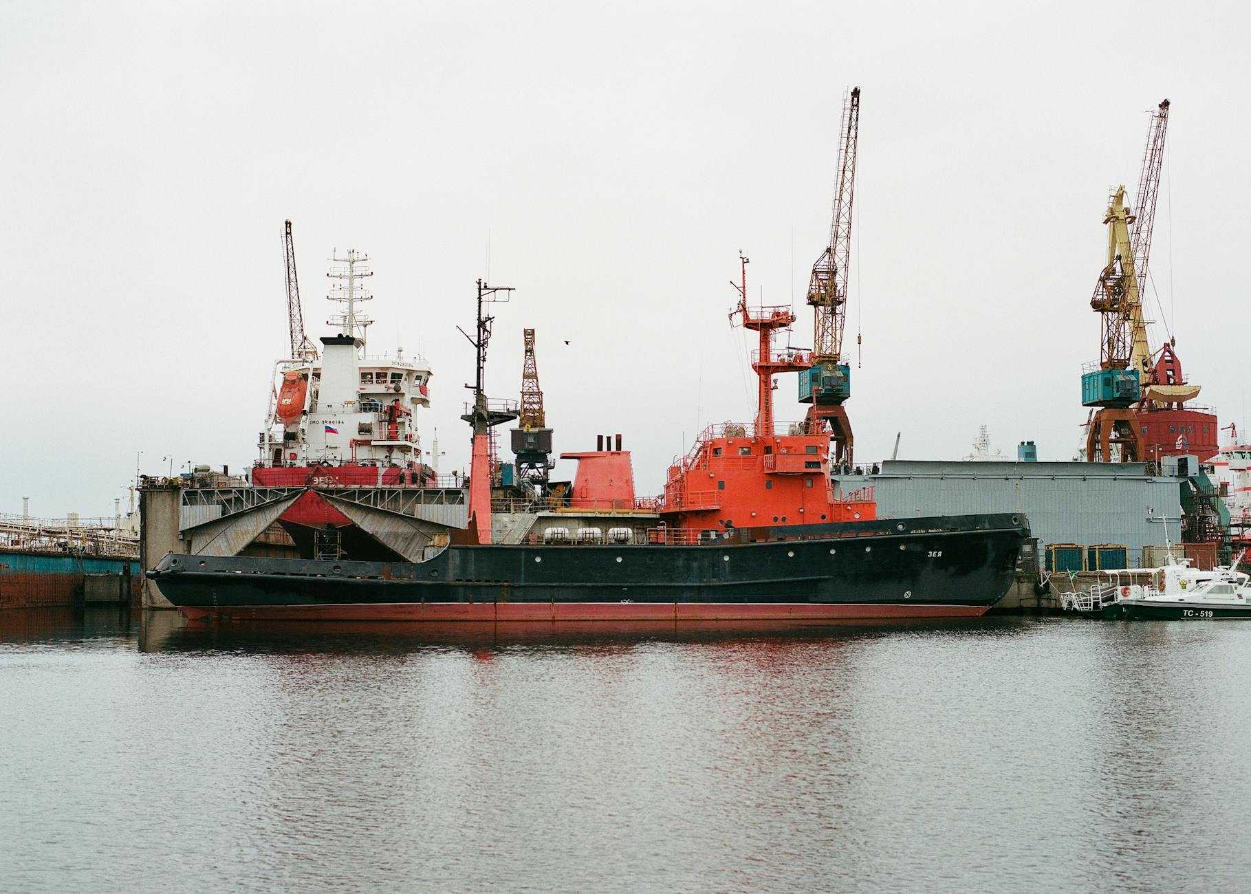 view of ship docking at reloading wharf
