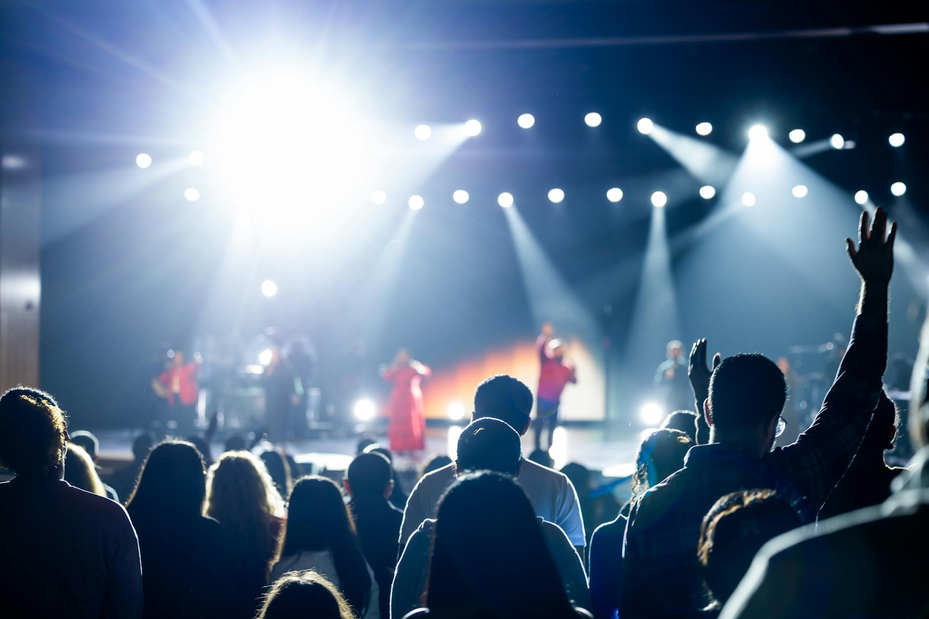 vibrant concert audience and stage lights