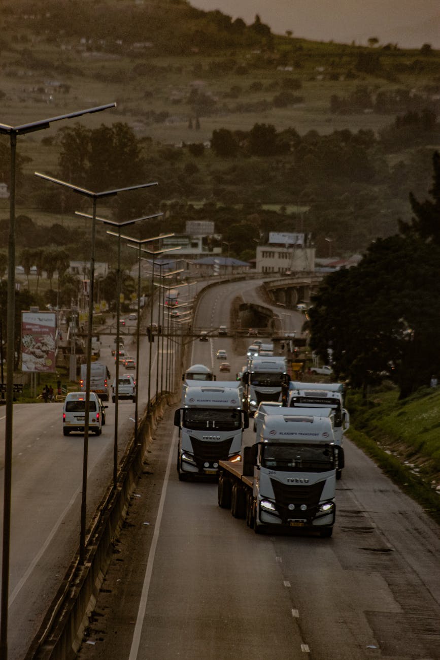 highway traffic in matsapha eswatini at dusk