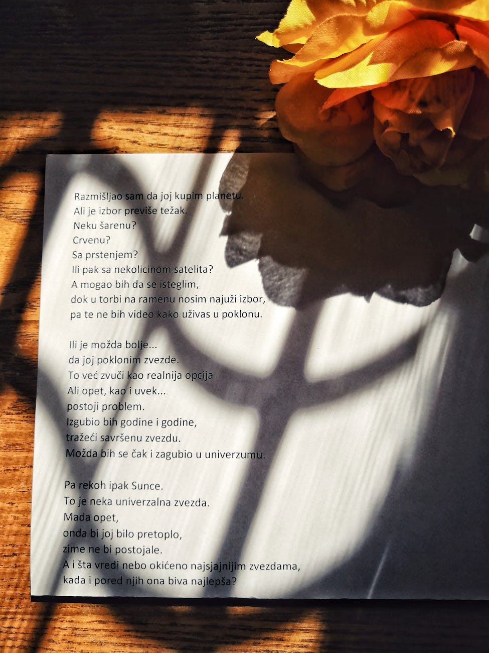 poem on a sheet under shadows