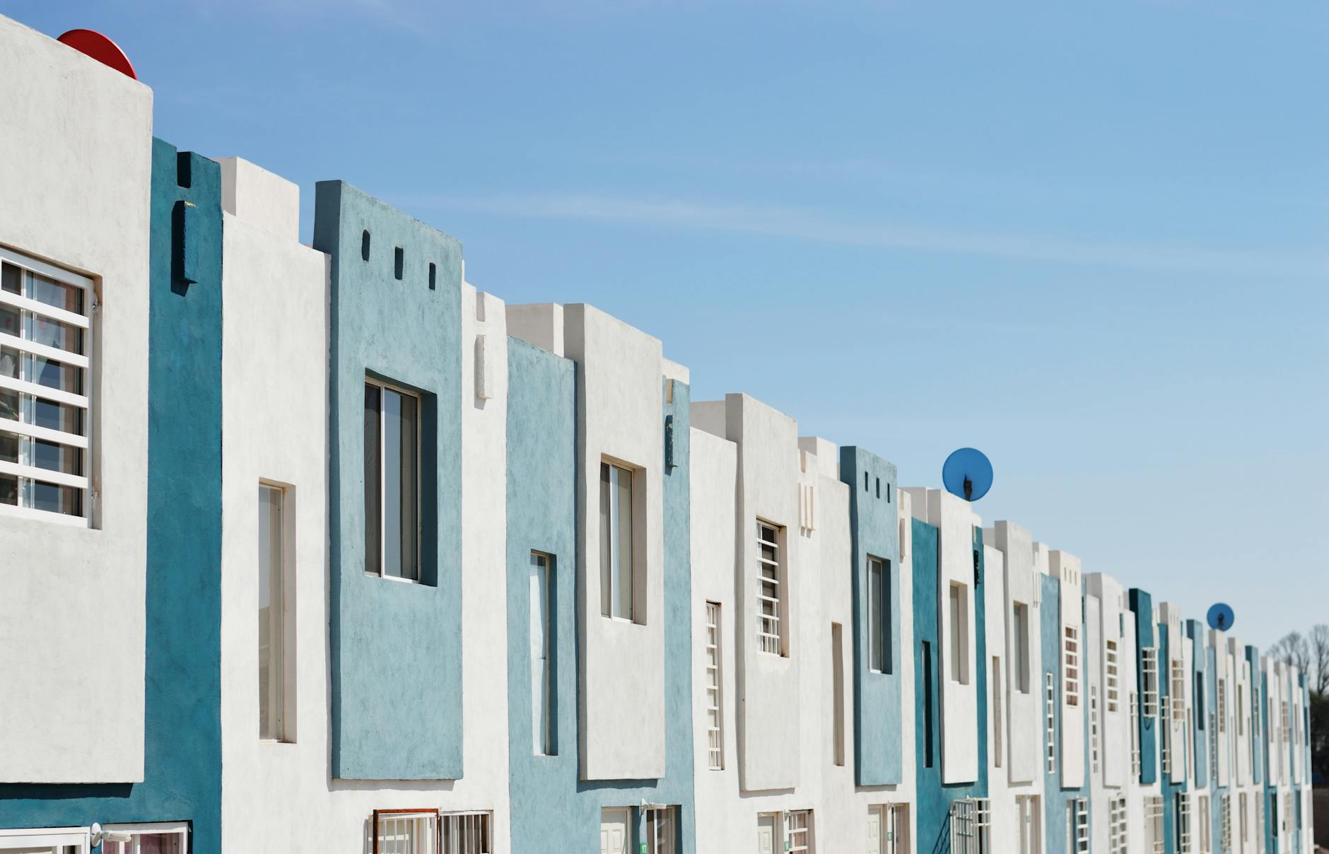 white and teal concrete buildings