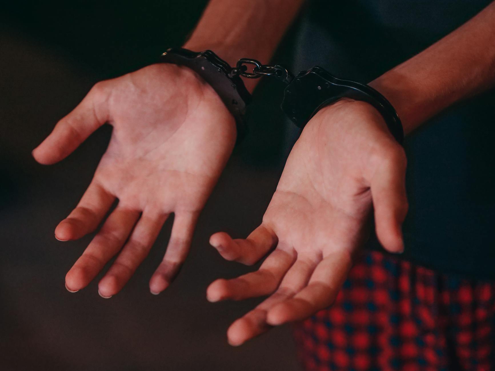 a person in handcuffs